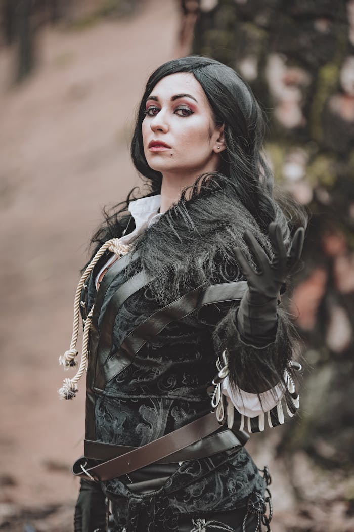 Services-03 Striking portrait of a cosplayer as a Witcher character outdoors.